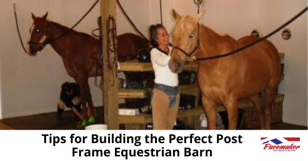 Woman grooming a horse in a post frame equestrian barn.